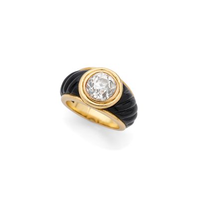a diamond and black enamel ring, by van cleef