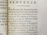 an open book with a picture of a man riding a horse