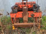 a small machine that is sitting in the grass