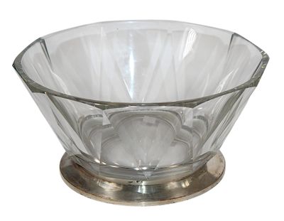 a glass bowl with a metal base on a white background