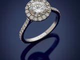 a diamond and platinum ring, by business