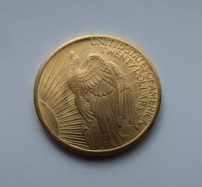 an image of a gold coin on a white surface