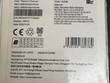 the back of a box of a cell phone with a sticker on it