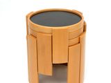 an image of a wooden table with a black top on a white background
