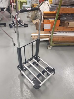 a cart that is sitting on the floor in a store