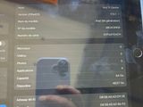 someone is taking a picture of a tablet with a sticky note attached to it