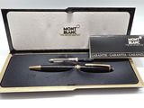 montblanc fountain pen in a box with a card and pen case