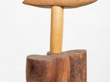 an image of a wooden stool with a wooden top on a white surface