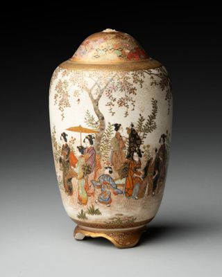 a vase that has a painting on it on it