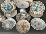 a lot of plates and cups that are on a table