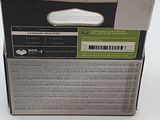 a box with a label on it sitting on a white surface