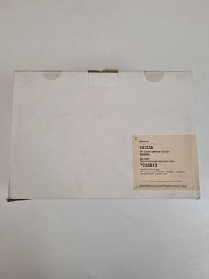 a white box with a label on it on a table