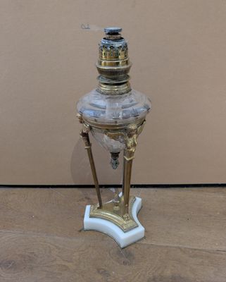 a lamp that is sitting on a wooden floor