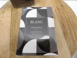 a book that is sitting on a wooden table