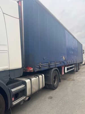 a large semi truck that is parked in a lot