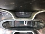 a close up of a car dashboard with a clock on it