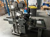 an image of a machine that is in a warehouse