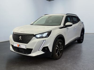 a white suv parked in a room with a black floor