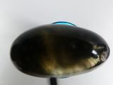 a close up of a spoon on a table