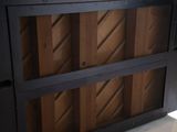 an image of a black cabinet with a wooden door