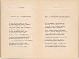 an open book with a poem written in french on it
