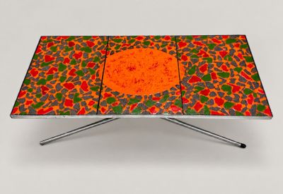 an image of a table with an orange and green design on it