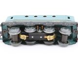 a blue and black train engine on a white background
