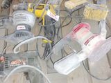 a lot of power tools that are on the floor