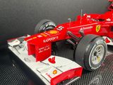 a model of a racing car on display in a display case