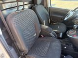 the interior of a car with two black seats and a steering wheel