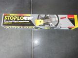 une photo d'une boîte de lubrifiant pour volant Stoploo