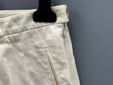 an image of a pair of pants hanging on a hanger