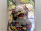 a close up of a pokemon card on a table