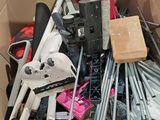 a cardboard box filled with tools and other items