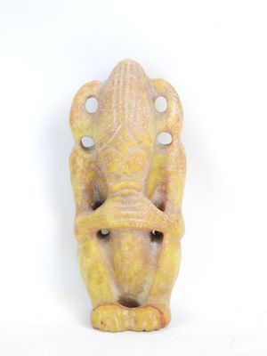 a close up of a statue of an elephant on a white background