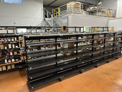 many shelves in the store with many items on them