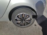 a close up of a tire on a car ' s rim