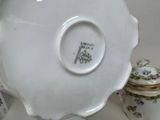 a white plate with a flower design on it