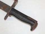 a knife that is laying on top of a table