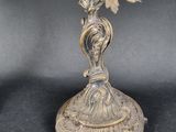 pair of antique silver plated candelabs with flowers and leaves