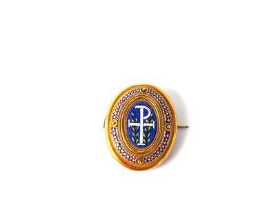 une image représentant une broche bleue et dorée ornée d'une croix