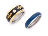 an image of a couple of rings sitting next to each other on a white surface