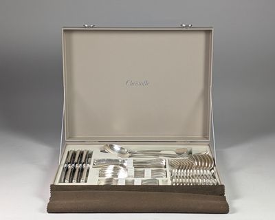 silver plated flatware set in a case with leather lining