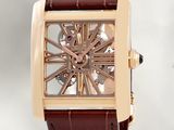 a brown strap around the wrist of a watch