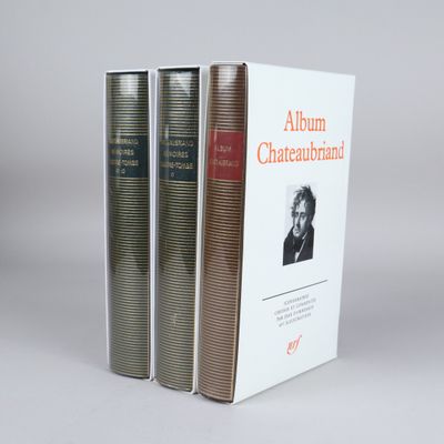 two books sitting on top of each other in front of a white background