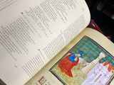 an open book that is sitting on a table