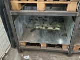 a small oven that has a lot of food inside of it