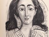 drawing of a woman with long hair and a checkered shirt