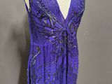 a purple dress on a mannequin mannequin mannequin mannequin mannequin mannequin mannequin mannequin mannequin