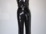 black sequinized jumpsuit on a mannequin mannequin mannequin mannequin mannequin mannequin mannequin mannequin